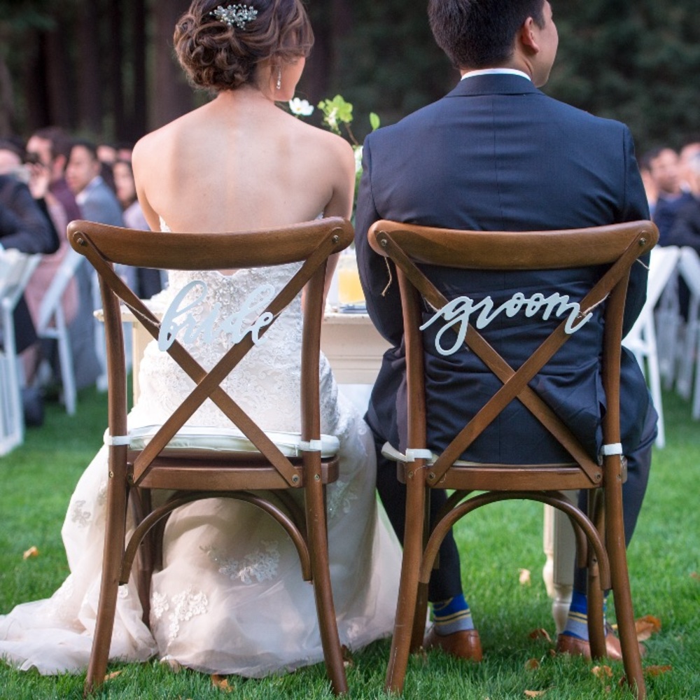 Wooden bride and groom sign
